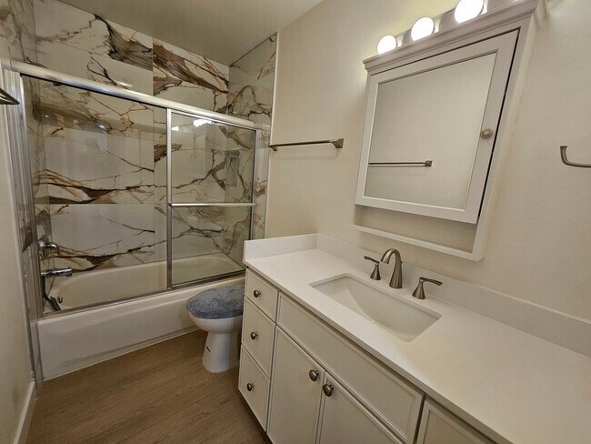Building Photo - Modern Comfort Meets Convenience — 4-Bedro...