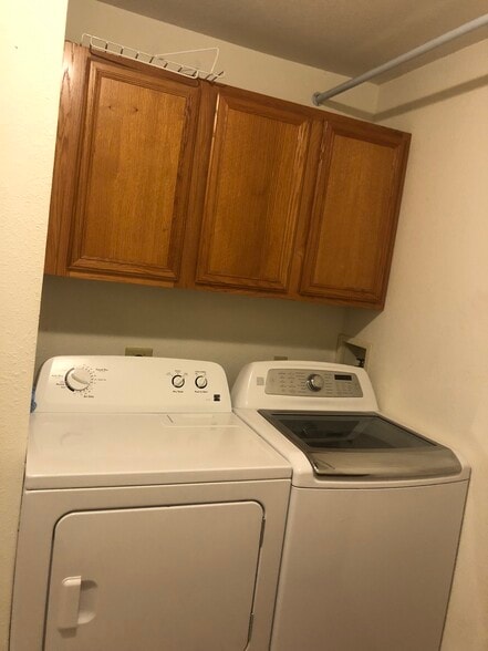 Washer and dryer on main floor. - 6223 Cross Bend Ct