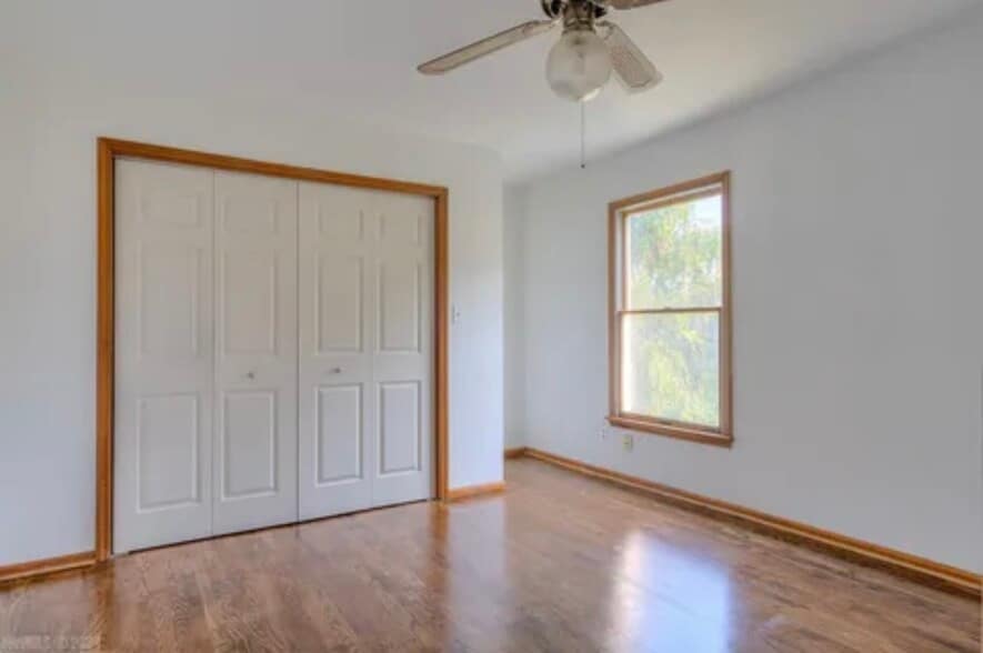 Bedroom #4 with large closets and sunny views from the upper level - 5163 Whitethorne Rd