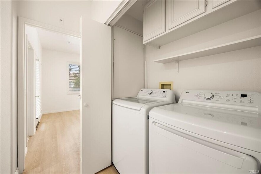 Upstairs laundry room - 2479 Sunningdale Dr