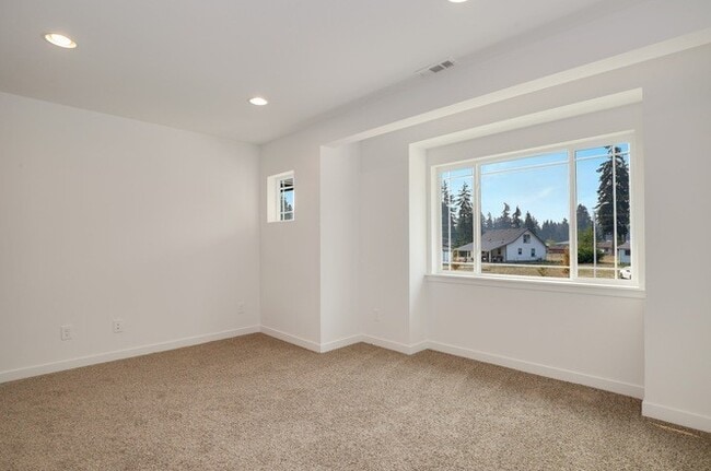 Building Photo - Modern Luxury: Spacious 3-Bedroom Home Near JBLM