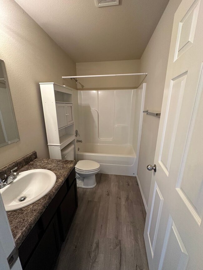 Building Photo - Country Living AND Convenience