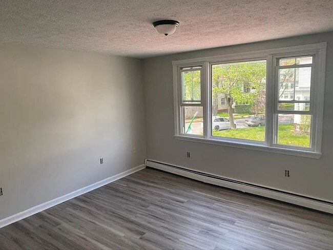 Building Photo - Sun-Filled 2-Bedroom in the Heart of Deering Center - Walk Everywhere