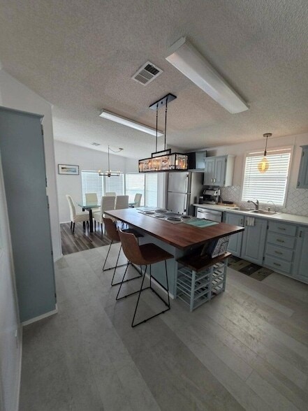 Building Photo - 6765 Spanish Lakes Blvd