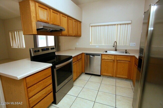 Building Photo - 9465 N Elan Ln