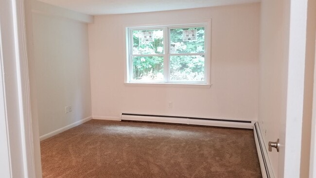 Building Photo - First floor, garden style condominium