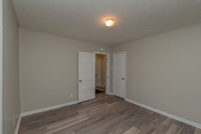 Building Photo - Brick home with a fenced-in yard!