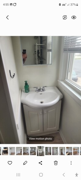 Bathroom sink - 214 W Main St