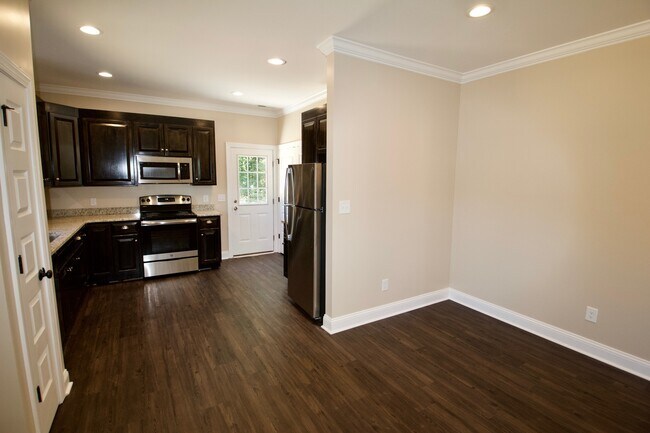 Building Photo - "Brand New Construction."  Quiet location, charming, cozy 3 bedroom duplex