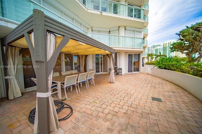 Building Photo - 16445 Collins Ave