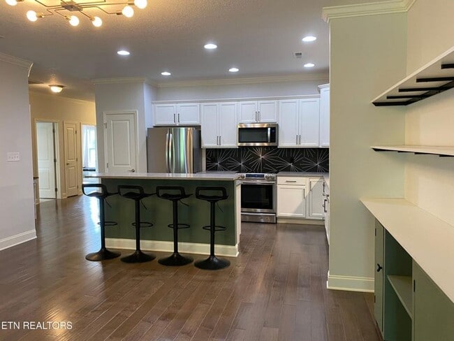 Building Photo - Live in Style, Relax in Comfort, and Love ...