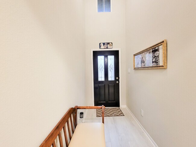 Building Photo - This stunning 2-year-old house with 4 beds, 3 baths, and an attached 2-car garage, it offers ampl...