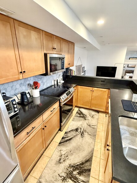 Kitchen with all new appliances and induction stove - 1240 4th St NW