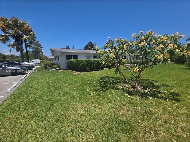 Building Photo - 120 NE 10th Ave