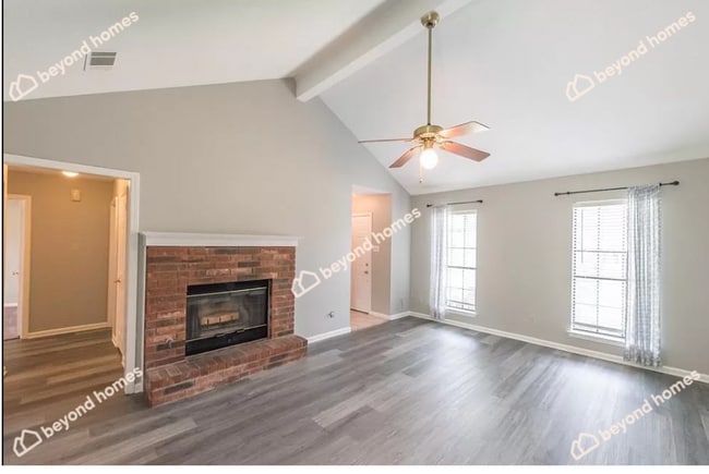 Building Photo - Updated 3BD/1.5BA Gem with Fireplace & Fen...