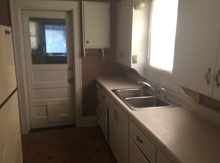 Kitchen into laundry/porch area - 2207 North Missouri Avenue
