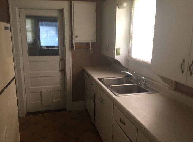 Kitchen into laundry/porch area - 2207 North Missouri Avenue
