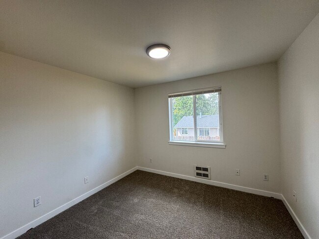 Building Photo - 943-945 99th St E