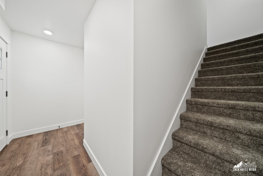 Entry and stairs to main living area - 1493 W 40th Ave