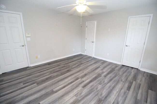 Building Photo - Live the Gulf Breeze Waterfront Life – Dock, Canal Access & Boat Lift!