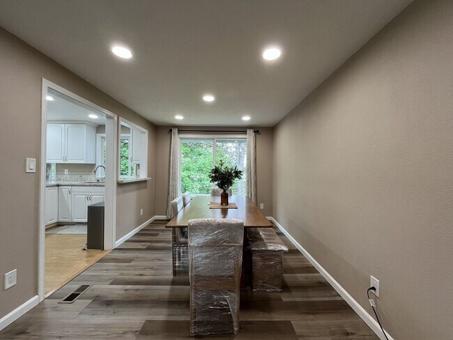 Building Photo - Three-Bedroom Home Near Nike Campus with Bonus Room, Large Deck & Two-Car Garage