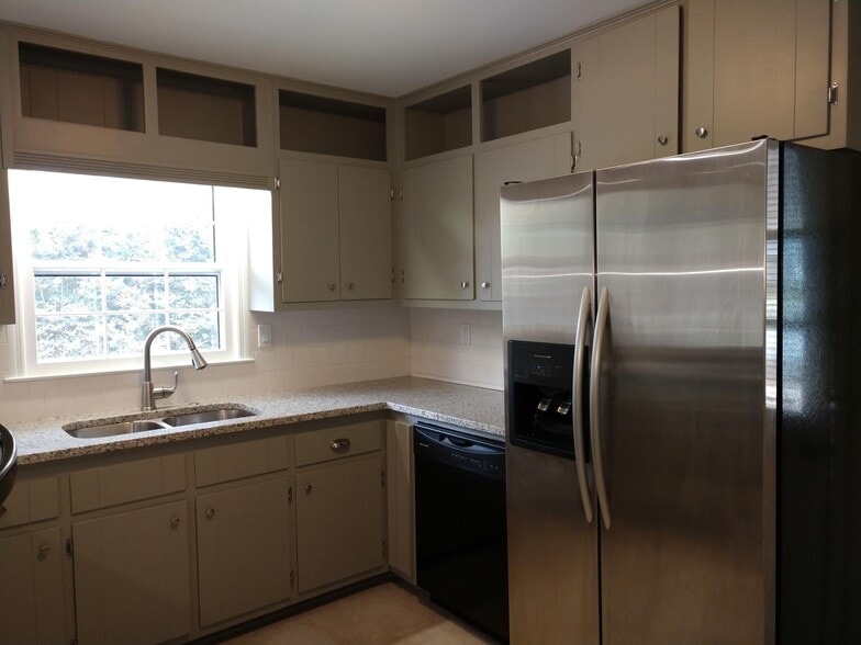 stainless refrigerator and dishwasher - 6457 Peacock Blvd