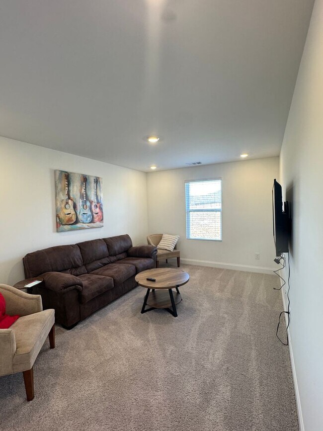 Building Photo - Fully Furnished 4BR Home with Loft, Patio & 2-Car Garage – Lawn Care Included