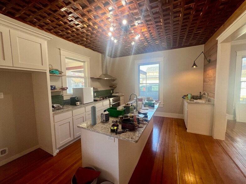 (Excuse the mess) Sneak peek of kitchen! I spy a gas stove and coffee bar! - 2115 Johnson St