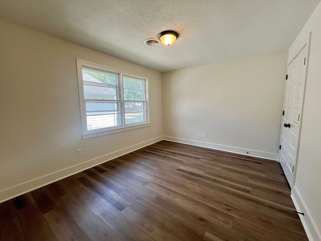 Building Photo - Fully Renovated 3BR/1.5BA – Prime Location + Lawn Care Included