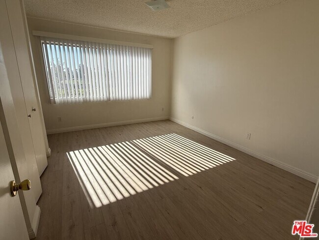 Building Photo - 10200 De Soto Ave