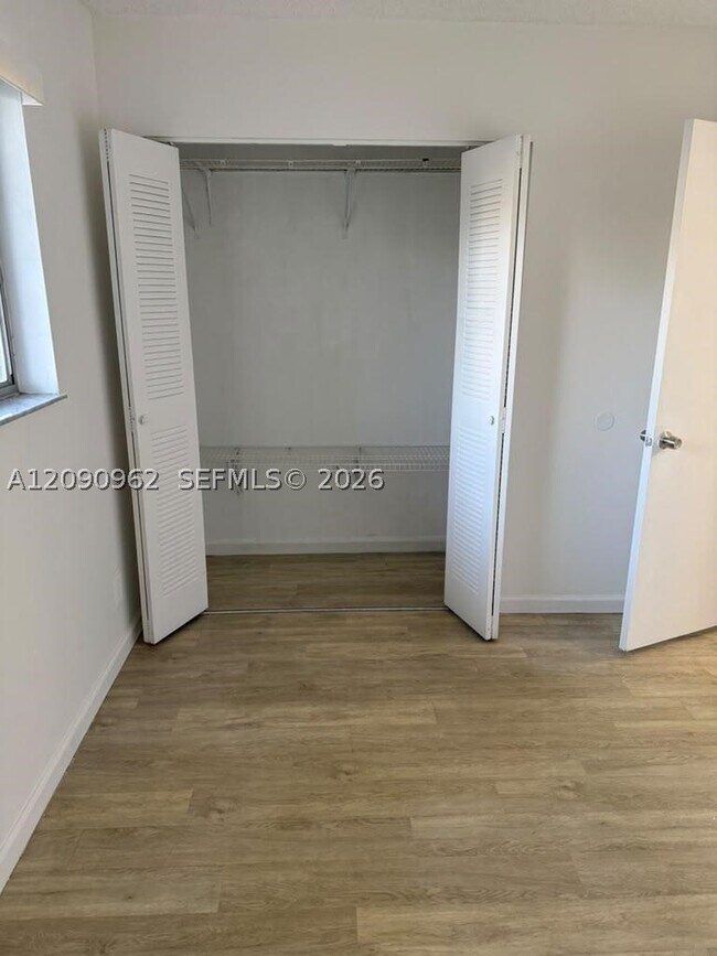 Building Photo - 8740 N Sherman Cir