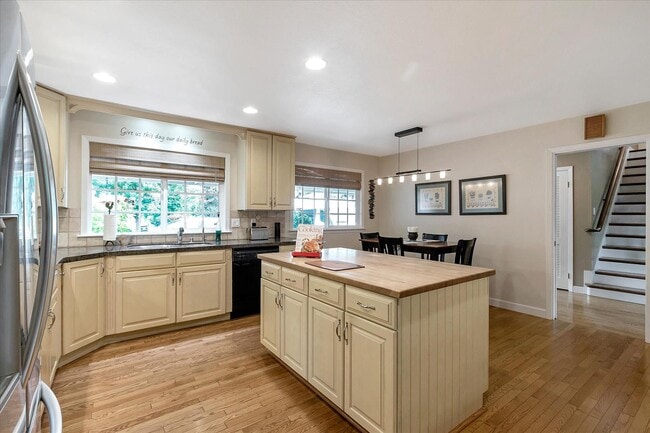 Building Photo - Executive Oasis l Huge Lot with Lush Green...