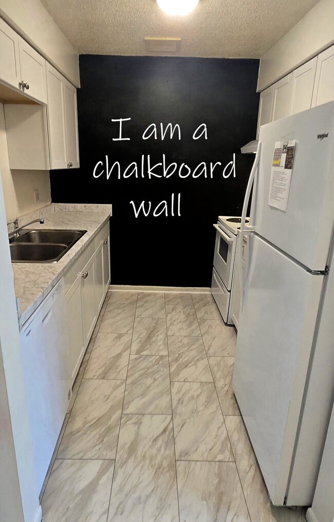 New cabinets, flooring, fridge and chalkboard wall - 349 Pearl St