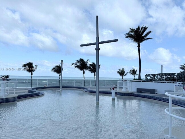 Building Photo - 18201 Collins Ave