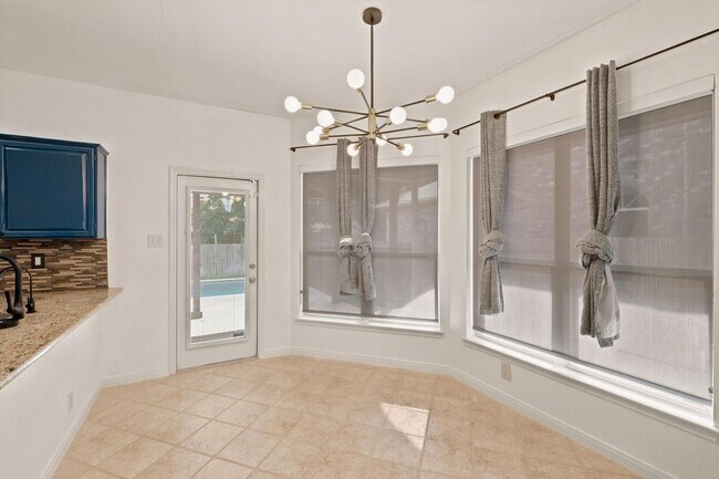 Building Photo - Your Backyard Oasis—Pool & Lawn Service Included