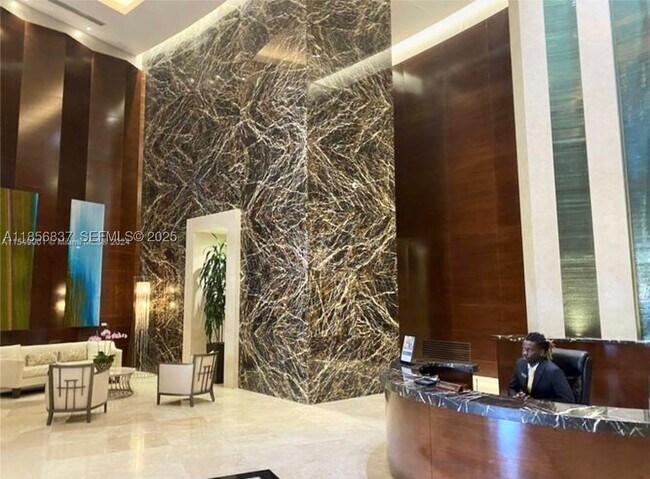 Building Photo - 15811 Collins Ave