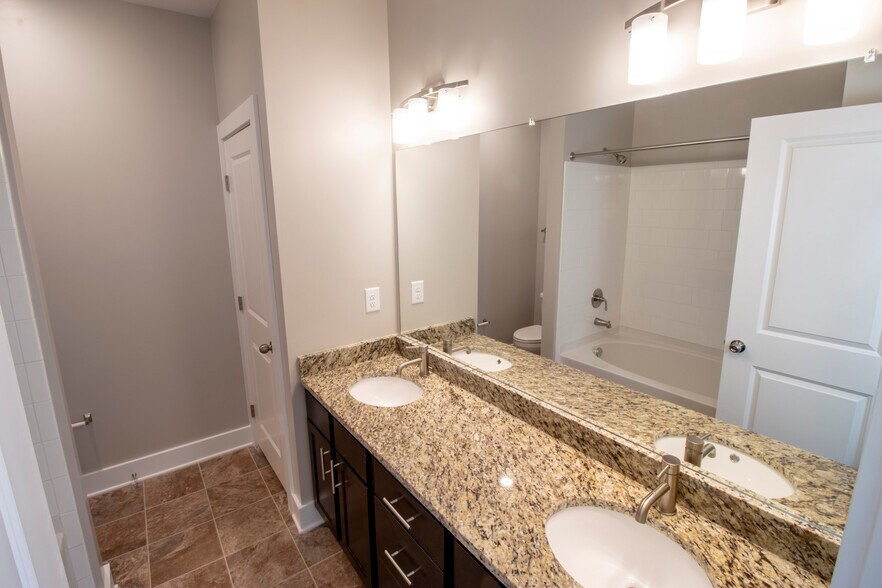 bath of owner suite with double vanity - 230 Signature Pl