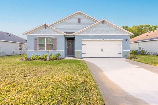 Building Photo - Never Lived in 4 Bed, 2 Bath Ormond Home with Upgrades and a Fenced Yard