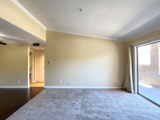 Building Photo - 1BR Condo with Private Balcony, Central A/C & Community Amenities in Corona
