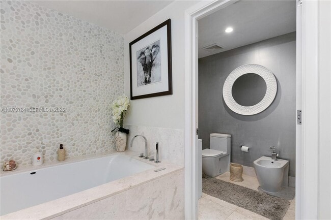 Building Photo - 17121 Collins Ave