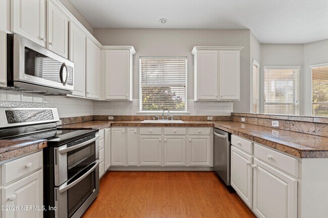 Building Photo - 7610 Sentry Oak Cir E