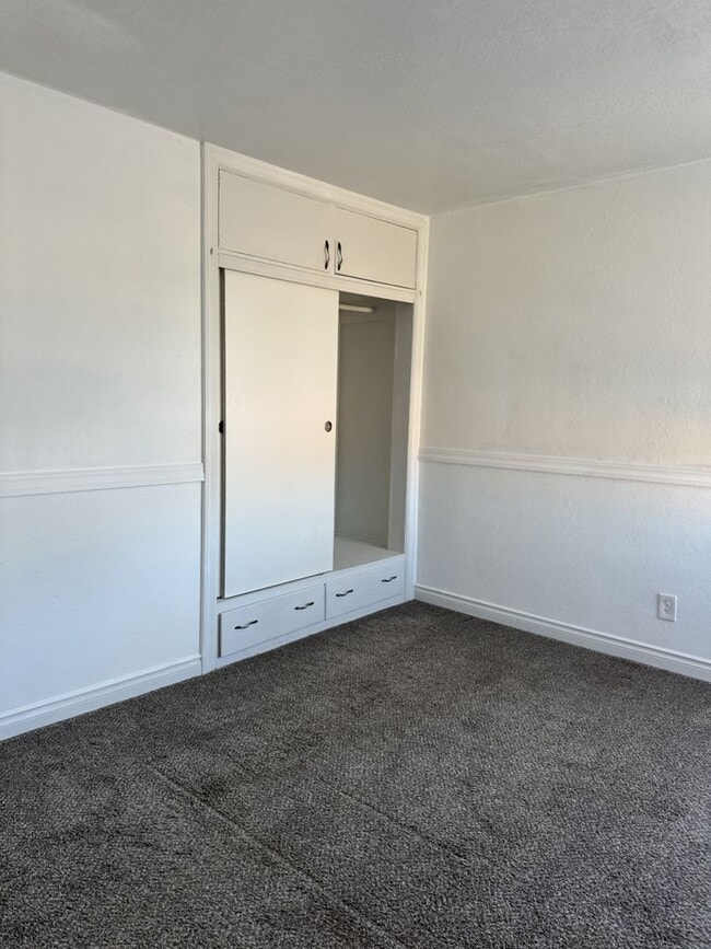 Building Photo - See the potential in this charming rental