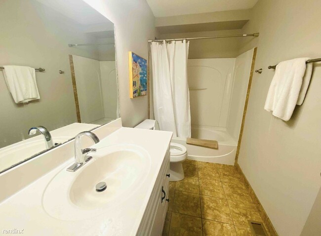 Building Photo - Room for Rent, 3 bath Duplex - 85 W 8th Av...