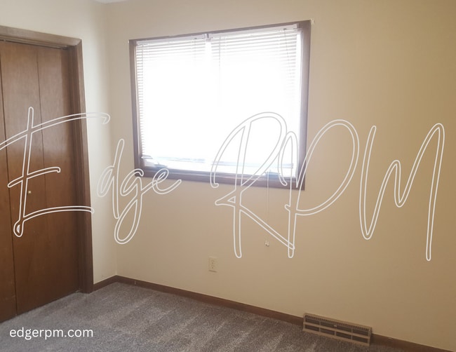 Building Photo - For Rent: 2BR Duplex w/ Garage – Great Loc...