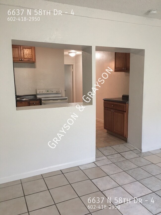 Building Photo - 6637 N 58th Dr