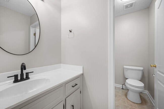 Building Photo - Charming Brick Home with Soaring Ceilings & Updated Finishes!