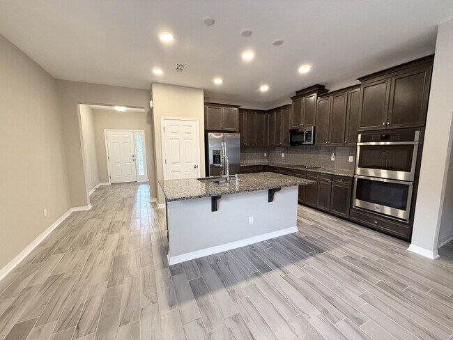 Building Photo - "Charming 3-Bed Oasis with 2 Full Baths in...