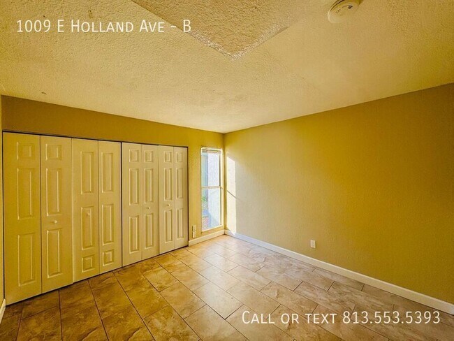 Building Photo - 1009 E Holland Ave