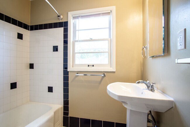Building Photo - In the Heart of NW-Mid-Century 2Bdr Lives ...
