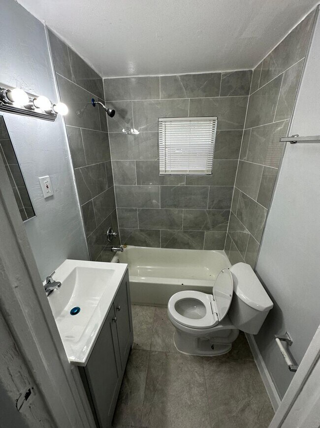 Building Photo - Fully Renovated 2/1 -Single Family Availab...
